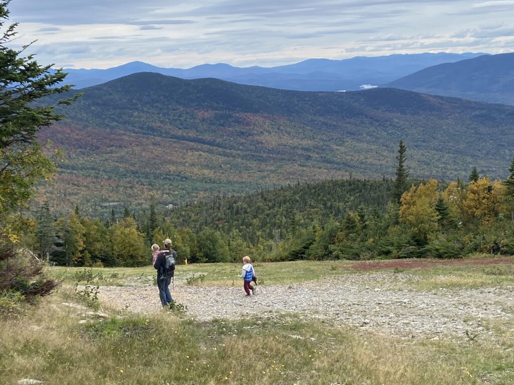 picture of family hiking in Maine mountains